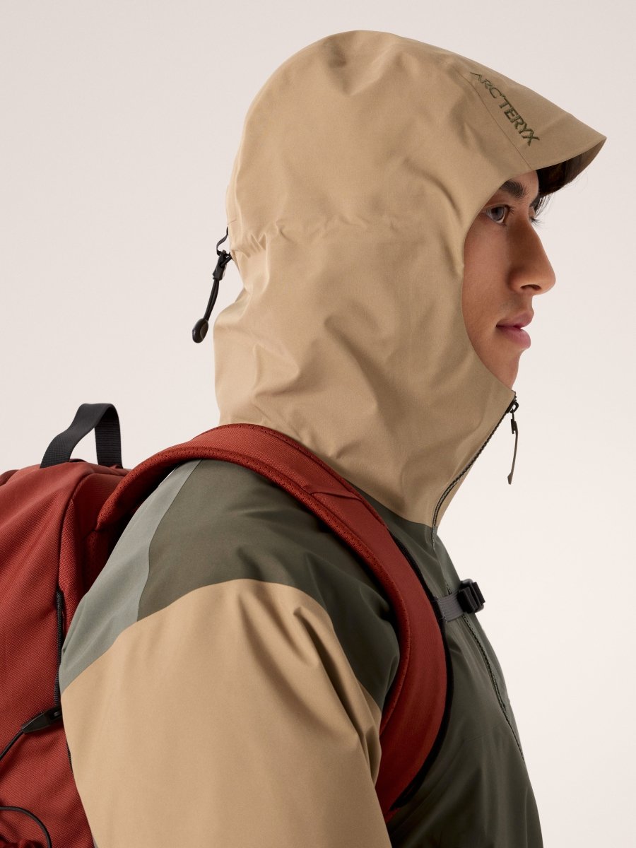 Arc'teryx Beta Jacket Men's in Tatsu colorway with hood up, side profile view
